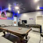 Game room with pool and arcade