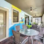 Outdoor dining with Mickey mural