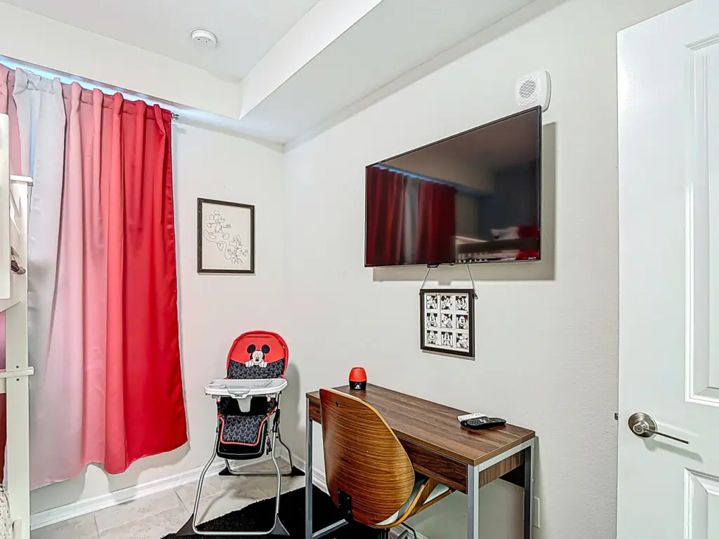 Highchair and workspace in Mickey Themed Bedroom