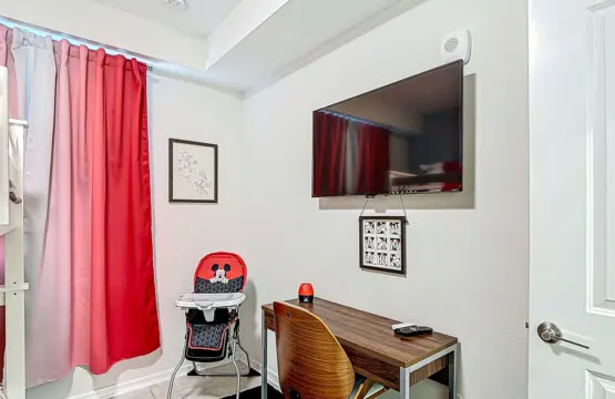Highchair and workspace in Mickey Themed Bedroom