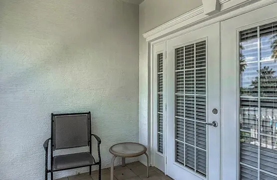 Enjoy the amazing View of the pool and golf course from the Private Balcony