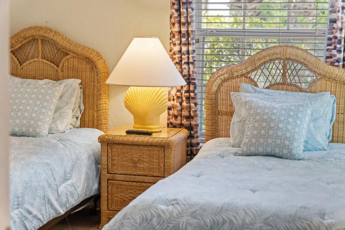 Comfortable twin beds with fresh linens and plenty of natural light.