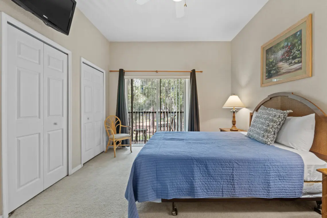 Cozy single bedroom with natural light and relaxing ambiance.