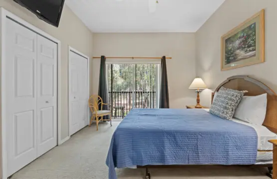 Cozy single bedroom with natural light and relaxing ambiance.