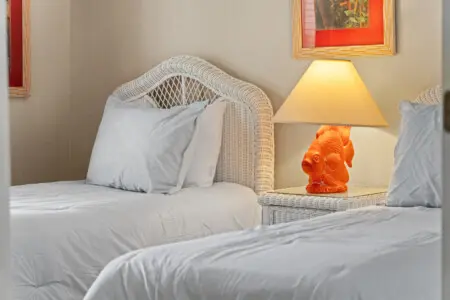 Peaceful twin room with coastal inspired décor.