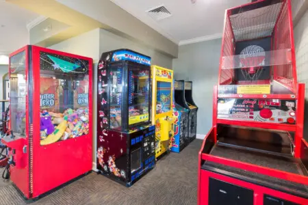 Indoor arcade with basketball and claw machines
