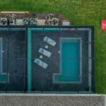 Private screened pool with lawn games