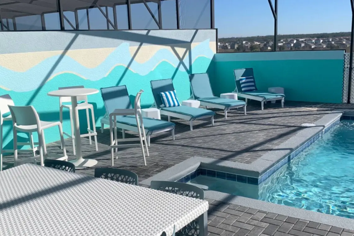 Screened pool area with loungers