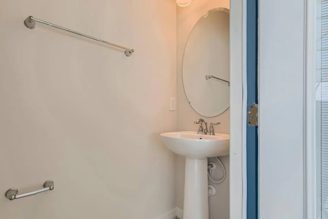 Bright guest powder room with sink