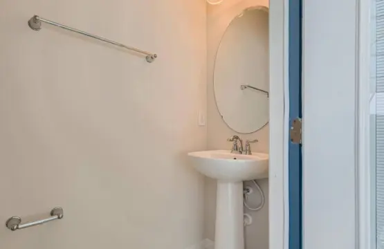 Bright guest powder room with sink