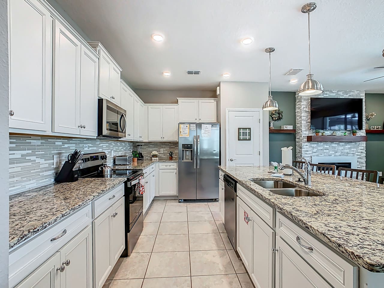 Modern kitchen with granite countertops and island